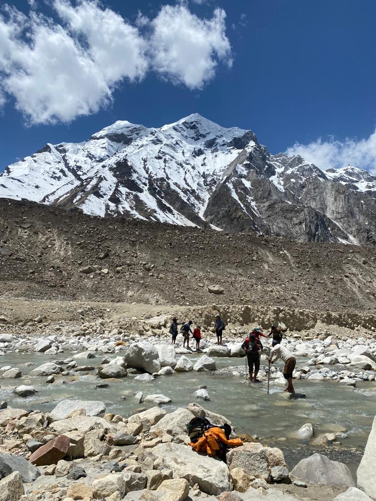 Crossing the glacial stream below the Bhagirathi peaks